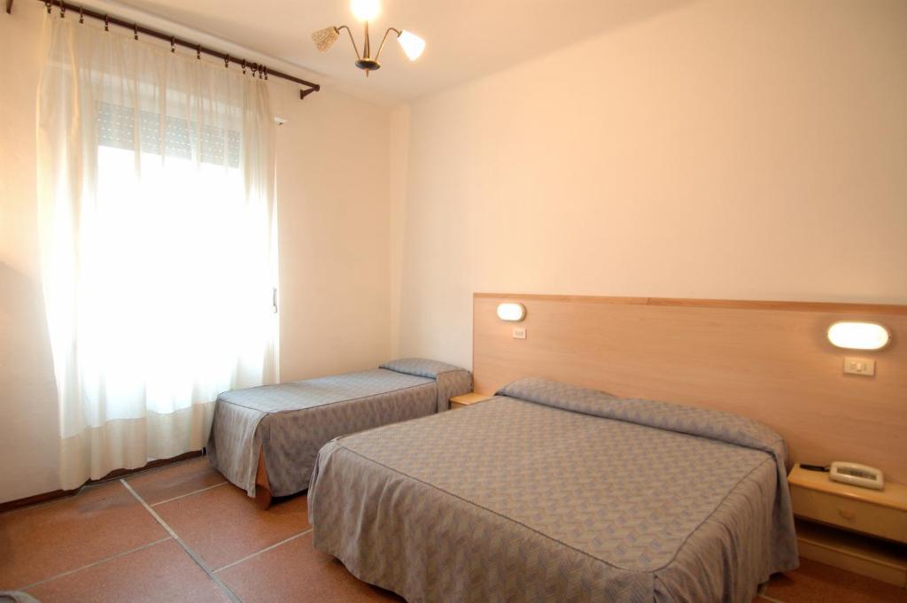 Hotel Moderno Pisa Zimmer foto